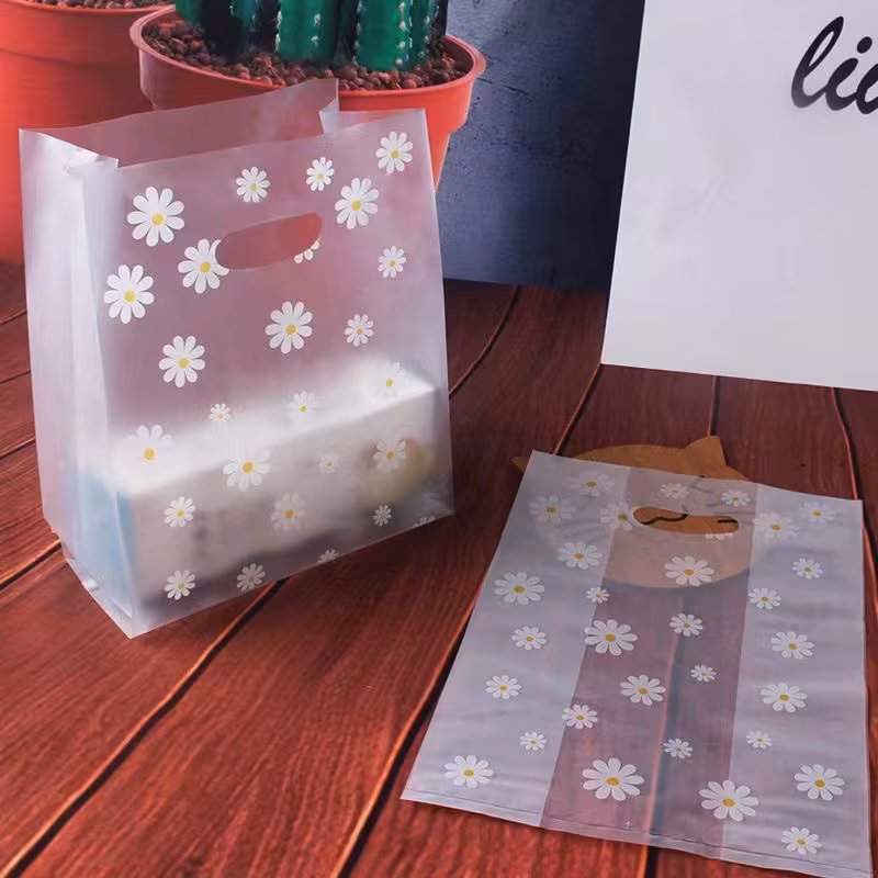 Bolsas de plástico desechables con asa troquelada – 200 uds.
